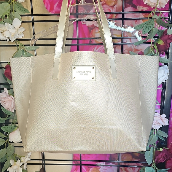 Michael Kors Handbags - Michael Kors Gold Tote Bag Elegant Spacious Design Never Used-  Storing Spots